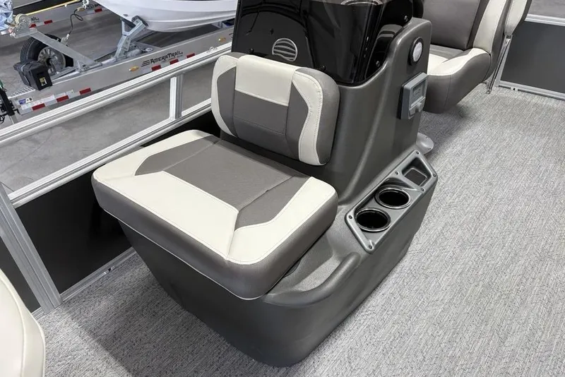 Slide: The Image of 2026 Sun Tracker Bass Buggy 16 XL Select boat seat with cup holders and modern design. - 9