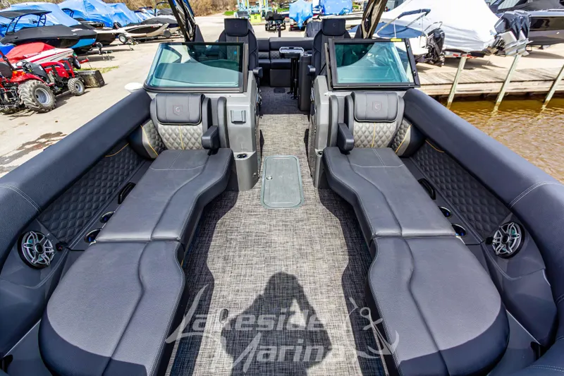 Slide: The Image of Luxurious interior of 2026 Godfrey Sanpan 2700 ULW Twin pontoon boat with plush seating. - 14