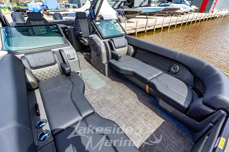 Slide: The Image of Luxurious interior of 2026 Godfrey Sanpan 2700 ULW Twin pontoon boat at marina. - 15