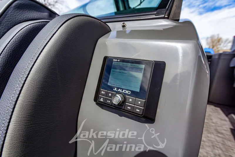 Slide: The Image of JL Audio system on 2026 Godfrey Sanpan 2700 ULW Twin boat dashboard. - 19