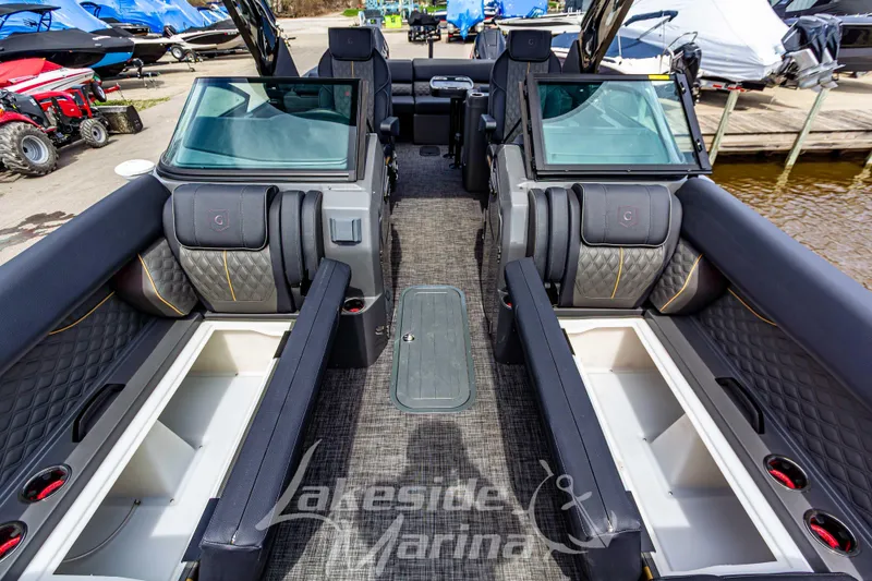Slide: The Image of Luxurious interior of 2026 Godfrey Sanpan 2700 ULW Twin pontoon boat at marina. - 23
