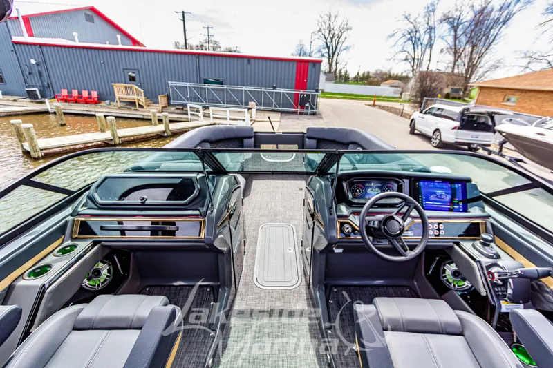 Slide: The Image of Interior view of 2026 Godfrey Sanpan 2700 ULW Twin boat with modern dashboard. - 26