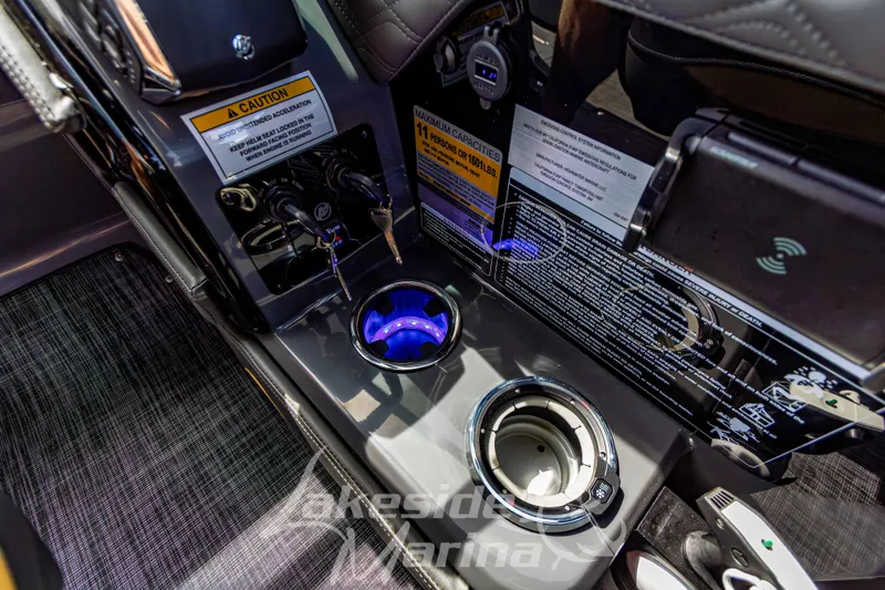 Slide: The Image of Interior of 2026 Godfrey Sanpan 2700 ULW Twin with illuminated cup holders and control panel. - 31