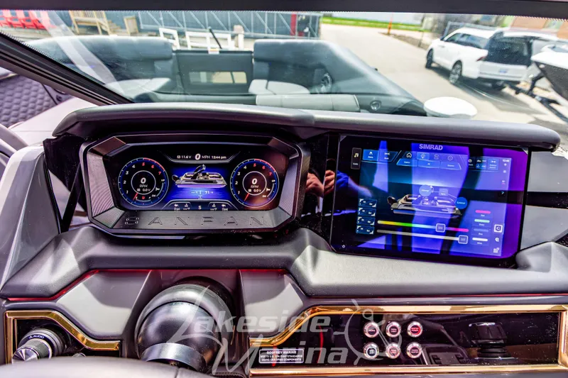 Slide: The Image of Dashboard of 2026 Godfrey Sanpan 2700 ULW Twin with digital displays and controls. - 33