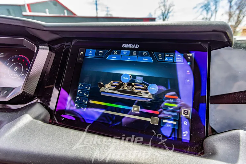Slide: The Image of Simrad touchscreen display on 2026 Godfrey Sanpan 2700 ULW Twin boat dashboard. - 34