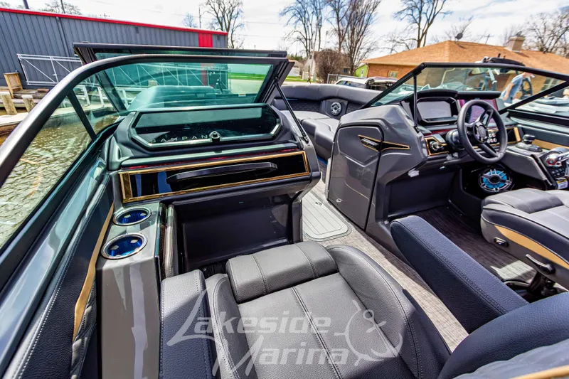 Slide: The Image of Interior of 2026 Godfrey Sanpan 2700 ULW Twin boat, featuring luxurious seating and modern dashboard. - 36