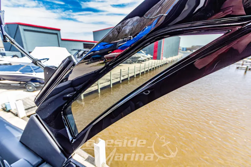 Slide: The Image of 2026 Godfrey Sanpan 2700 ULW Twin boat detail at dockside marina. - 39