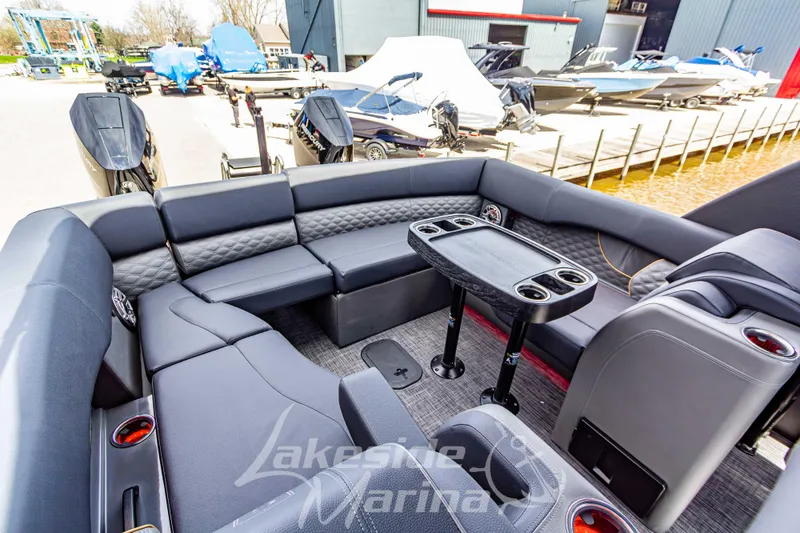 Slide: The Image of Luxurious seating area on 2026 Godfrey Sanpan 2700 ULW Twin pontoon boat at marina. - 43