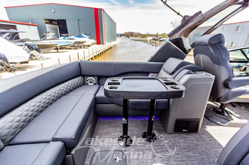 Slide: The Image of Luxurious interior of 2026 Godfrey Sanpan 2700 ULW Twin pontoon boat at marina. - 46