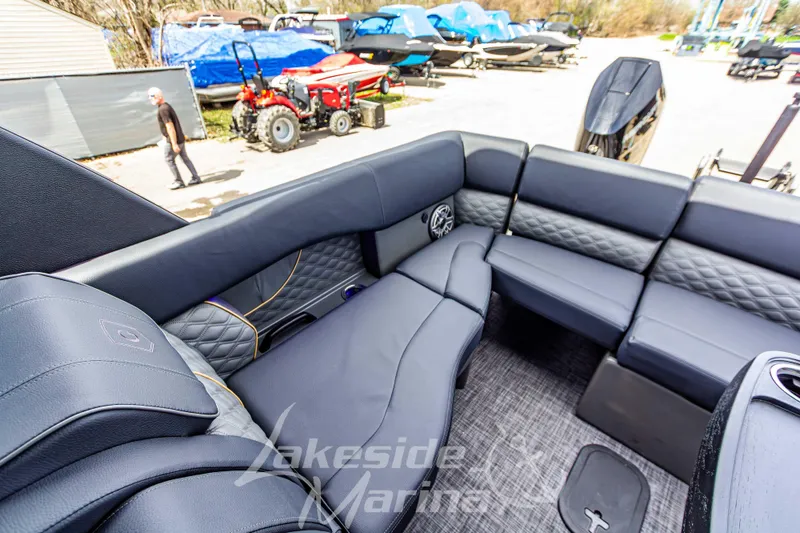 Slide: The Image of Luxurious seating on 2026 Godfrey Sanpan 2700 ULW Twin pontoon boat at marina. - 47