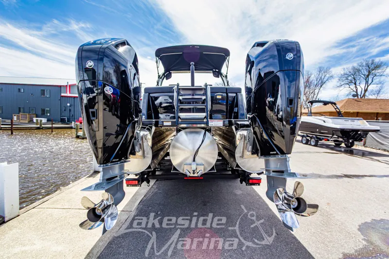 Slide: The Image of 2026 Godfrey Sanpan 2700 ULW Twin pontoon boat with dual engines at Lakeside Marina. - 5