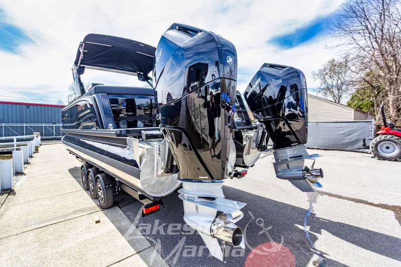 Slide: The Image of 2026 Godfrey Sanpan 2700 ULW Twin pontoon boat with dual Mercury outboard engines. - 6