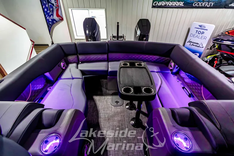 Slide: The Image of Luxurious interior of 2026 Godfrey Sanpan 2700 ULW Twin pontoon boat with ambient lighting. - 62