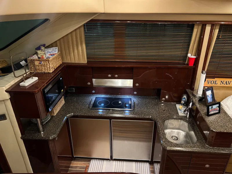 Slide: The Image of Interior of 2007 Sea Ray 52 Sedan Bridge yacht kitchen. - 14