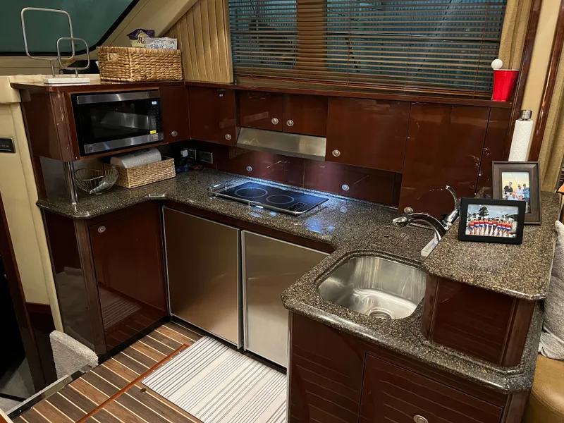 Slide: The Image of Interior of 2007 Sea Ray 52 Sedan Bridge yacht kitchen. - 15