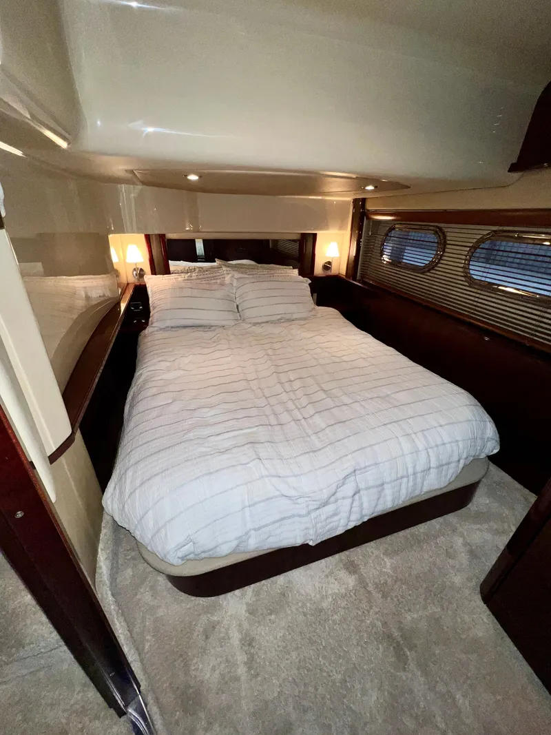 Slide: The Image of Luxurious bedroom on a 2007 Sea Ray 52 Sedan Bridge yacht. - 18