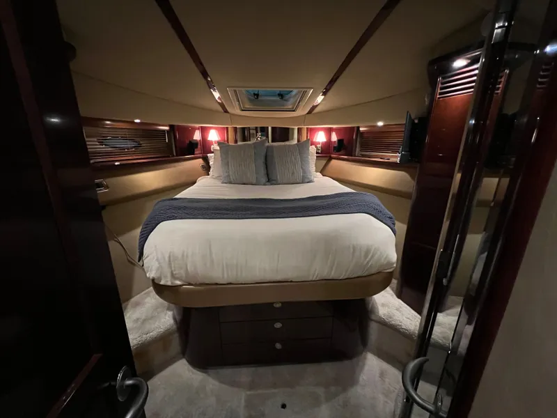 Slide: The Image of Luxurious bedroom in a 2007 Sea Ray 52 Sedan Bridge yacht. - 21