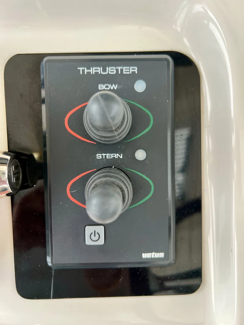 Slide: The Image of Bow and stern thruster controls on 2007 Sea Ray 52 Sedan Bridge. - 38
