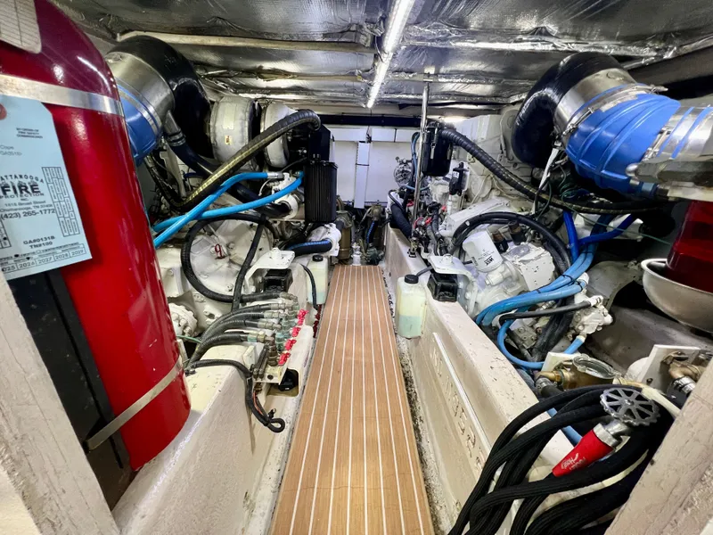 Slide: The Image of Engine room of 2007 Sea Ray 52 Sedan Bridge with fire extinguisher. - 45