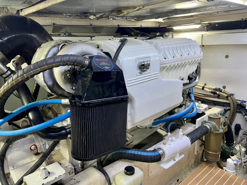 Slide: The Image of Engine room of 2007 Sea Ray 52 Sedan Bridge with turbocharger. - 47