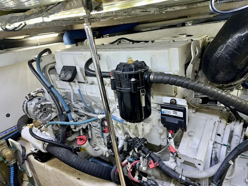 Slide: The Image of Engine room of 2007 Sea Ray 52 Sedan Bridge. - 49