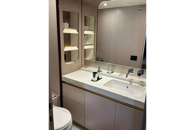 Slide: The Image of Luxurious bathroom in 2021 Azimut Fly 60 yacht with modern fixtures and elegant design. - 14
