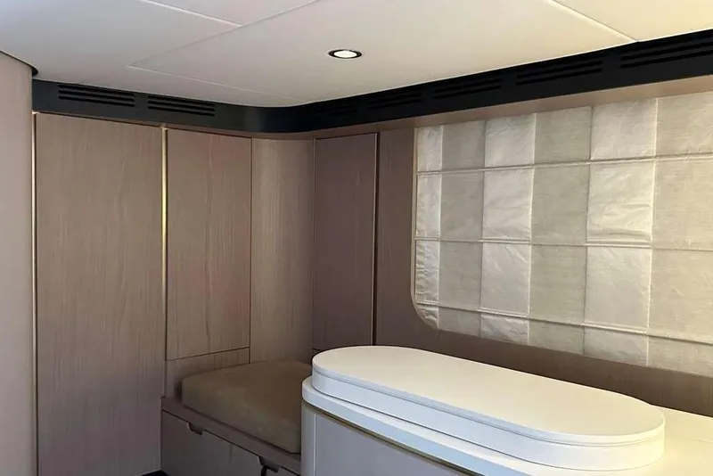 Slide: The Image of Luxurious interior of 2021 Azimut Fly 60 yacht with modern design and elegant finishes. - 16