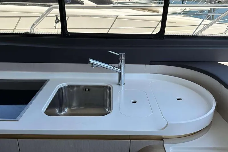 Slide: The Image of Modern kitchen sink and faucet on 2021 Azimut Fly 60 yacht. - 20