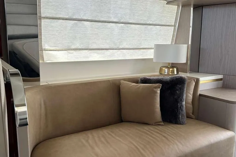 Slide: The Image of Luxurious interior of 2021 Azimut Fly 60 yacht with beige sofa and elegant lamp. - 21
