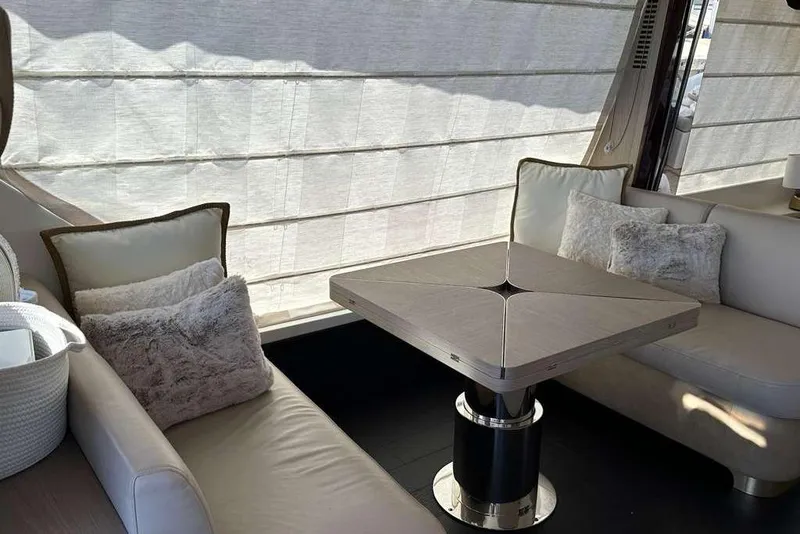Slide: The Image of Luxurious interior of 2021 Azimut Fly 60 yacht with plush seating and elegant table. - 22