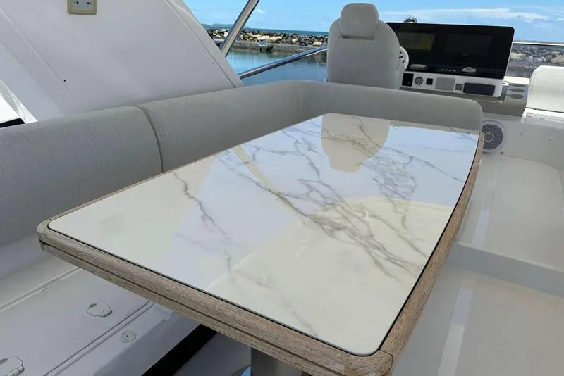 Slide: The Image of Luxurious interior of 2021 Azimut Fly 60 yacht with elegant marble table. - 25