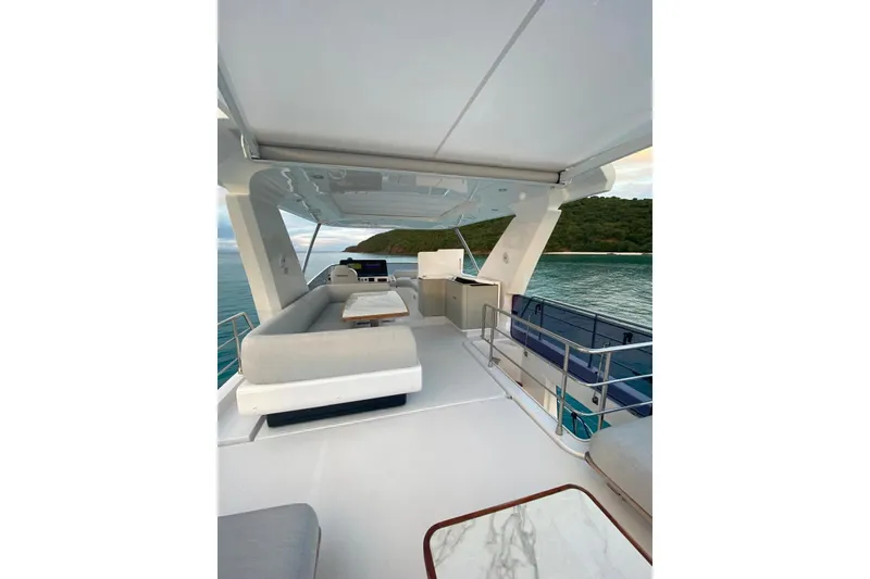 Slide: The Image of Luxurious 2021 Azimut Fly 60 yacht interior with elegant seating and ocean view. - 3