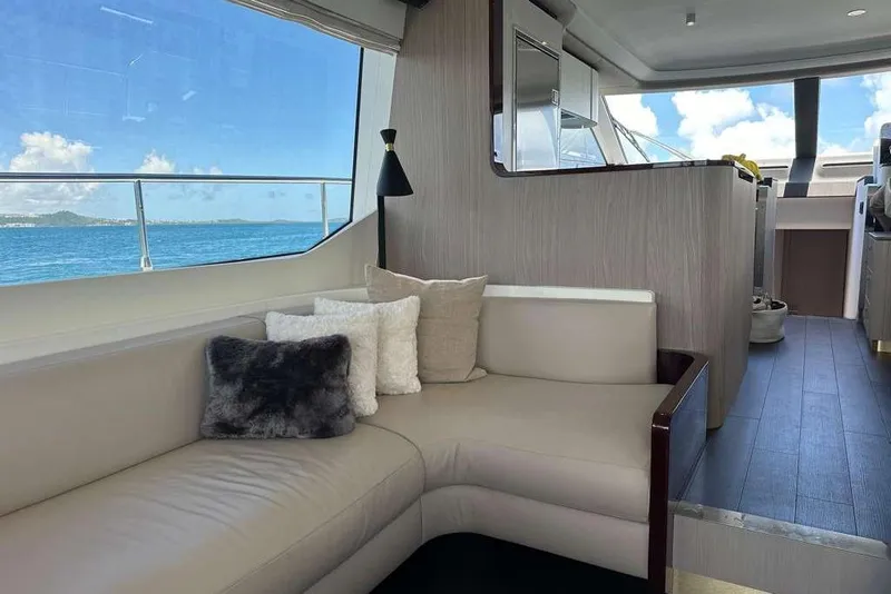 Slide: The Image of Luxurious interior of 2021 Azimut Fly 60 yacht with ocean view and plush seating. - 33