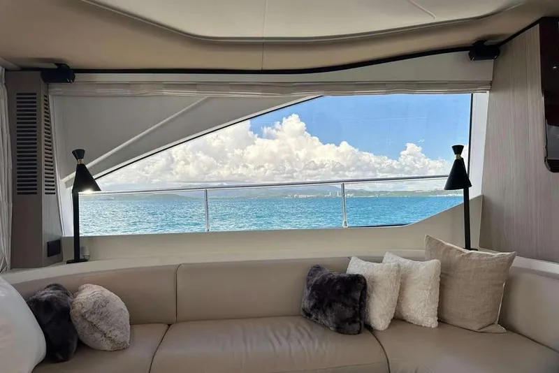 Slide: The Image of Luxurious interior of 2021 Azimut Fly 60 yacht with ocean view through large window. - 34