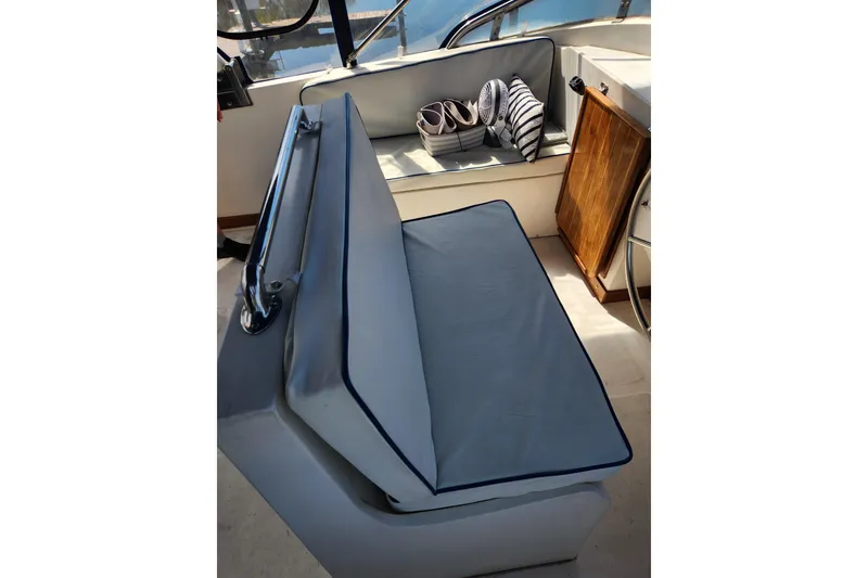 Slide: The Image of Interior seating of 1987 Jefferson 42 SE Sundeck Motor Yacht with nautical decor. - 12