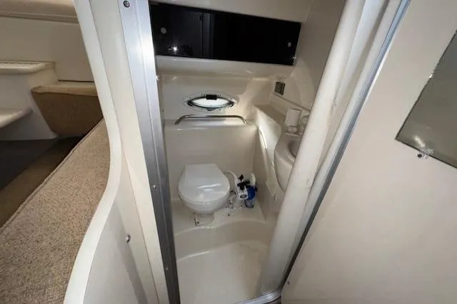 Slide: The Image of 2001 Bayliner 2855 Ciera boat bathroom interior with toilet and sink. - 15