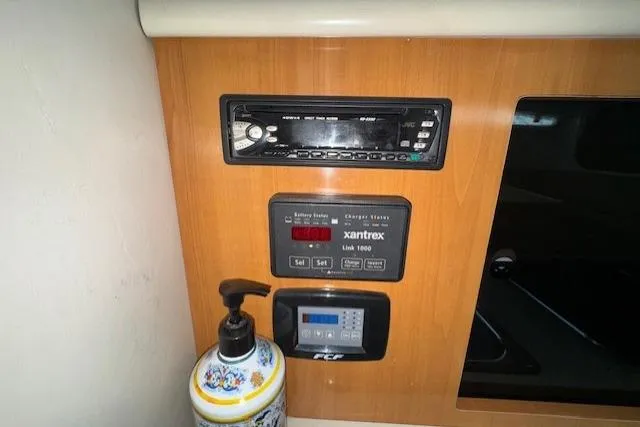 Slide: The Image of Control panel of a 2001 Bayliner 2855 Ciera boat with electronic displays. - 8