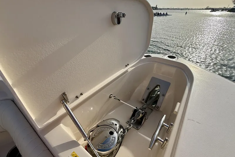 Slide: The Image of Anchor compartment of 2012 Grady-White Canyon 336 boat on water. - 13