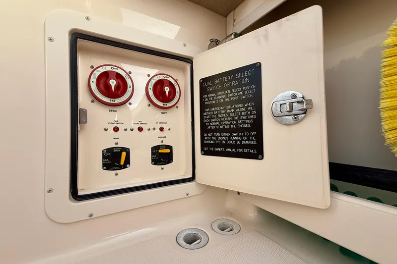 Slide: The Image of Dual battery switch panel on 2012 Grady-White Canyon 336 boat, featuring operation instructions. - 18