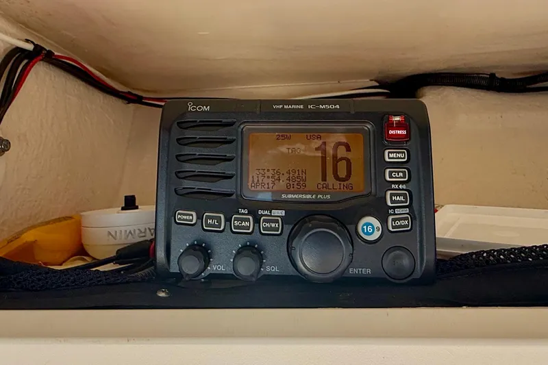Slide: The Image of VHF marine radio on 2012 Grady-White Canyon 336 boat, displaying channel 16. - 30