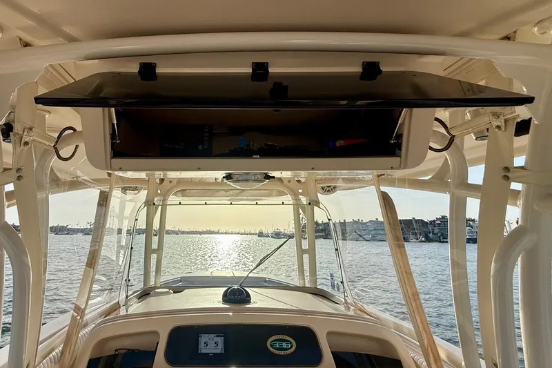 Slide: The Image of Interior view of 2012 Grady-White Canyon 336 boat, overlooking a scenic waterfront. - 31