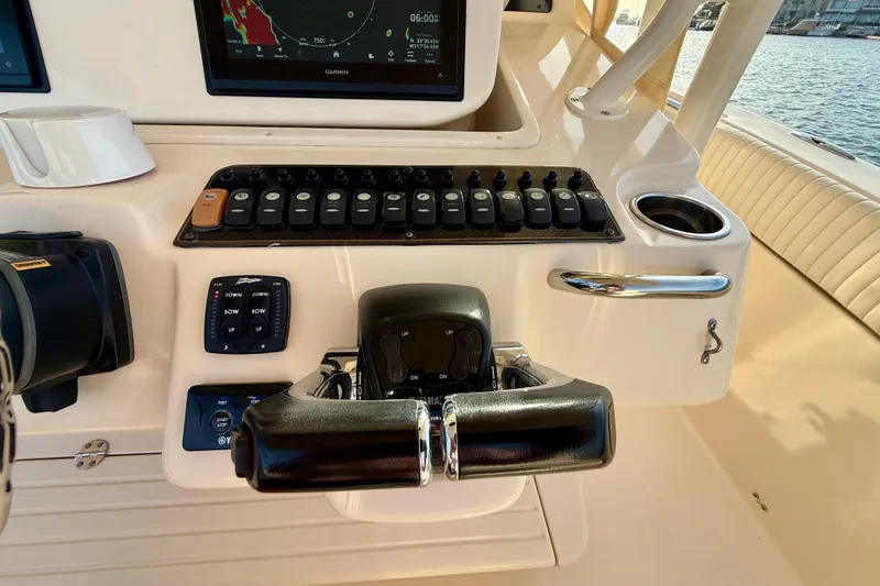 Slide: The Image of Control panel of a 2012 Grady-White Canyon 336 boat with navigation display. - 36