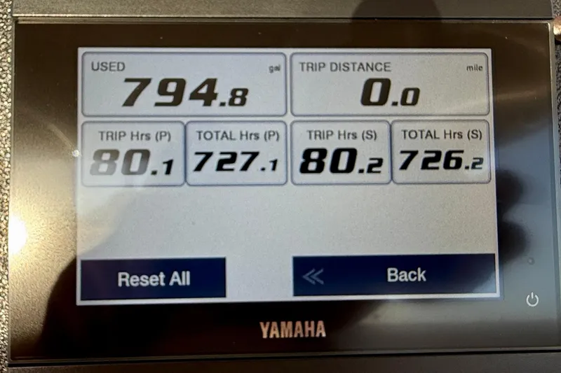 Slide: The Image of Yamaha display showing engine hours and trip data for 2012 Grady-White Canyon 336. - 38