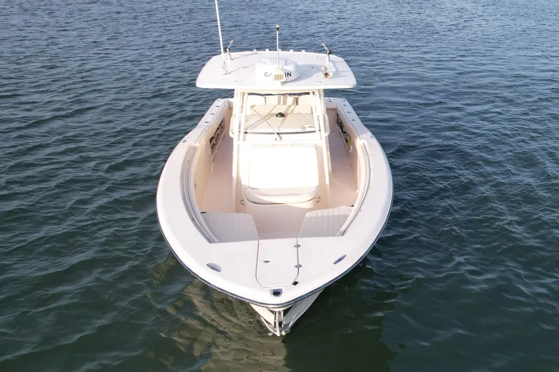 Slide: The Image of 2012 Grady-White Canyon 336 boat on calm water, aerial view. - 6