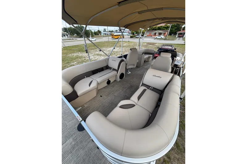 Slide: The Image of Interior of 2026 Bentley Pontoons Legacy 223 Navigator with luxurious seating. - 14