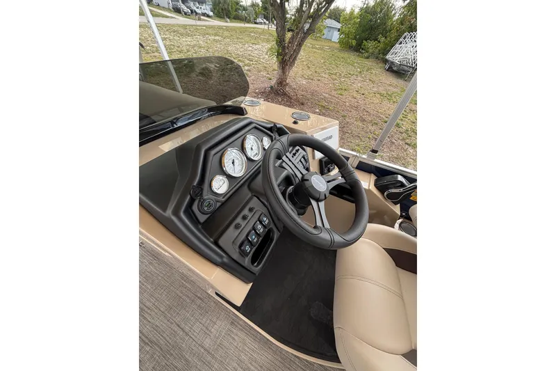 Slide: The Image of Interior view of Bentley Pontoons Legacy 223 Navigator 2026 cockpit. - 19