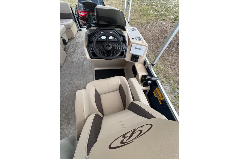 Slide: The Image of Interior of Bentley Pontoons Legacy 223 Navigator 2026 with steering console. - 20