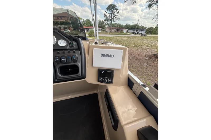 Slide: The Image of Interior view of Bentley Pontoons Legacy 223 Navigator 2026. - 21