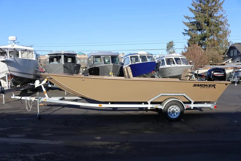 The Image of 2026 Smoker Craft Pro Sportsman 1866 boat on trailer, parked outdoors. - 0