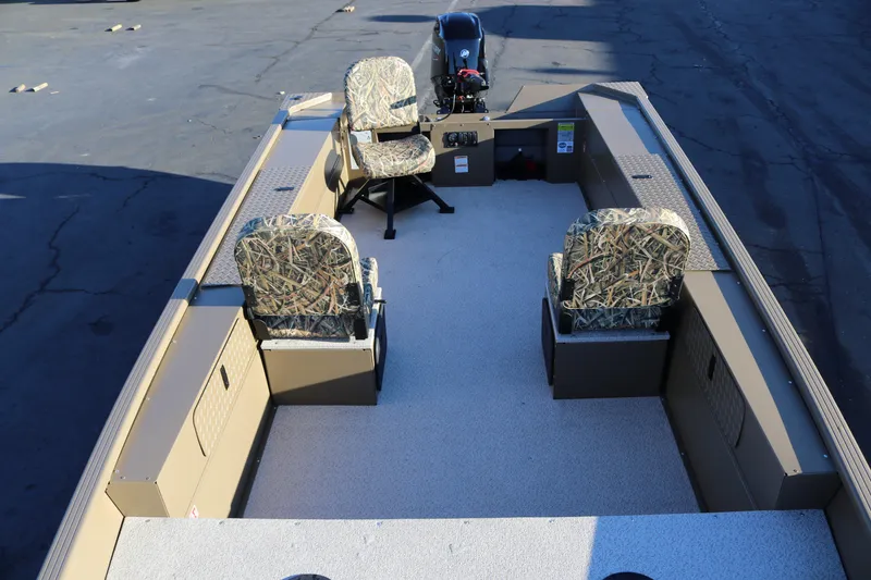 Slide: The Image of 2026 Smoker Craft Pro Sportsman 1866 boat interior with camouflage seats. - 16